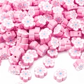 Perles fleurs en pâte polymère rose avec centre bleu pour bijoux faits à la main - 30 Pièces/Paquet (10x4mm) / Rose
