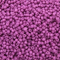 Pink purple seed beads for DIY jewelry making with smooth glass finish in macro view - Purple