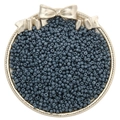 Dark blue glass seed beads in a decorative tray for DIY handmade jewelry crafts - Gray