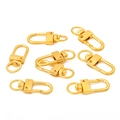 Detailed view of polished gold alloy heart-shaped swivel lobster clasps for DIY jewelry making - Gold
