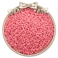Polished pink glass seed beads for DIY jewelry displayed in a vintage metal tray - Light Peach Pink