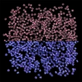 Luminous pink seed beads for DIY jewelry showing a bright glow effect in the dark - Magenta