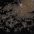 Schillernde Blasenperlen für DIY-Harzkunst, die aus einem klaren Kunststoffglas fließen - 30g/Packung Durchmesser 2-3.5mm / Dunkelbraun