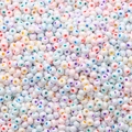 Cuentas de perlas rosas con núcleo de colores para hacer pulseras DIY - 2mm / Paquete de 20g (Aprox. 1300 Pcs) / Color macarrón