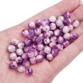 8mm purple gradient rose acrylic beads for DIY jewelry making held in a hand - 100 Pieces Pack / White to Purple Gradient