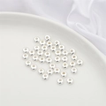 Polished silver flat round spacer beads for DIY jewelry making displayed on a ceramic dish - 10 Pieces (6x2.5mm) / Silver - Curved Bead