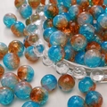 Ronde glazen kralen met blauw en oranje craquelé-effect voor DIY-armbandsieraden - 10mm (Set van 20) / Blauw Bruin Mix