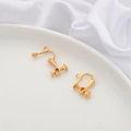 Golden spiral clip-on earring converters for non-pierced ears on a white tray - 15x20mm (4 Pcs/Pack) / 18K Gold Plated Screw Ear Clip