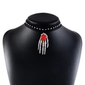 Detailed shot of Gothic lace choker featuring a skull hand pendant and a red 3D rose - Black Skeleton Claw