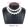 Detail of chunky double-layer faux pearl choker showing large glossy beads on a display stand - Double Layer Large Pearl Necklace (N11500) / White