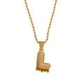 Macro shot of gold-plated hip hop letter L pendant with zircon and rope chain - L