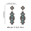 Detail showing dimensions of vintage silver bohemian earrings with turquoise stones - E12735