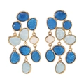 Detail of layered gold-tone earrings with multi-colored blue and white resin stones - Blue