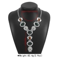 Detailed view of vintage Baroque resin statement necklace with mixed gemstone pendants - Short Necklace