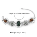 Detail of vintage baroque resin bracelet with emerald green and brown stones on white background - Bracelet (B2997)