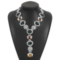 Baroque style necklace with green and amber resin stones on silver-toned metal base - Antique Silver Long Style