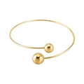 Vista dettagliata del bracciale aperto dorato minimalista con grandi sfere lucide finali - Perline Grandi e Piccole
