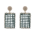 Detailed view of bohemian gold grid earrings with dark green raffia and crystals - Dark Green