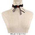 Detail shot of black lace choker with red gems, 36cm length and 8cm extension chain - Gothic Retro Ruffled Lace Three Oval Red Rhinestone Style (N12745)