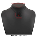 Macro view of black spider pendant with red rhinestone and gothic choker details - Red Gem Spider