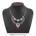 Detail view of Bohemian layered turquoise necklace showing tribal engraving and size dimensions - N12842