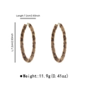 Detail shot of large leopard print plush hoop earrings showing texture and 7.2cm diameter - Light Leopard Small Hoop