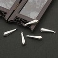 Detailed view of silver cone-shaped metal pendants with hole texture for DIY jewelry - Silver 8x31 20 Pieces/pack