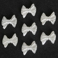 Parelmoer witte ABS-strikjes van hars voor DIY-haaraccessoires en sieraadontwerpen - Geperforeerde strik (Kunstmatige parel) / 100 Stuks/Pak (11x14mm) / Beige