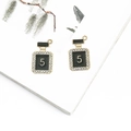 Schmuckanhänger in Form einer schwarzen Parfümflasche mit goldener Nummer 5 DIY - Parfümflasche - Schwarz Strass / 2 Stück/Set