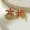 Macro detail of gold-plated seashell earrings with red enamel starfish on white stone - Red Enamel Starfish Shell Style (FYD6224EH) / Red