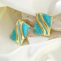 Golden rectangular stainless steel earrings featuring artistic blue marble enamel texture - Blue