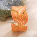 Gold leaf bangle with orange enamel texture on a natural stone background - Rose Red