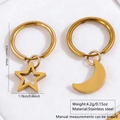Golden stainless steel star and moon hoop earrings with precise 3.03cm height measurement - Star Moon Earrings