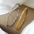 Bamboo style open bangles in gold and silver finish with polished stainless steel texture - Gold and Silver