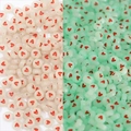 Perline tonde piatte in acrilico con cuori rossi in color crema e verde menta per DIY - Cuore Rosso e Bianco Trasparente Luminoso