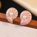 Macro detail of pink enamel conch earrings with white pearl center and gold trim - Pink (FYD6150EH-pink)