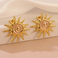 Golden sun-shaped stainless steel earrings with pink enamel center and spiral textures - Pink