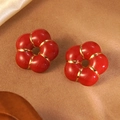 Close-up of red enamel 304 stainless steel flower earrings with gold outlines - Red