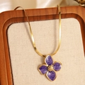 Golden snake chain necklace featuring a purple enamel floral pendant in a wooden tray - Necklace Only (FYD6111XL-purple)