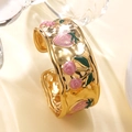 Detail of gold-plated strawberry and cherry enamel patterns on hammered cuff bracelet - Pink Style (FYD6208SZ-pink)