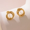 Detail of elegant gold double loop entwined stud earrings on white stone background - Double Ring Twisted Style (HQ6036)