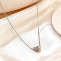 Polished silver heart pendant necklace on premium champagne silk background fabric - Silver