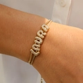 Detail showing a gold-plated double-layer box chain bracelet with LAURA zircon letters - Labor Fee For Bracelet