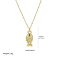 Golden fish pendant necklace with white crystals and black stone eye on O-chain - Fish Style / Pendant Only