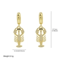 Boucles d'oreilles homard en laiton doré avec cristaux blancs et yeux noirs - Homard