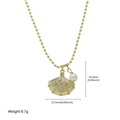 Golden bead chain shell necklace with pearl pendant and cubic zirconia accents - Scallop Style
