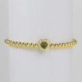 Elegant 18k gold beaded elastic bracelet featuring a heart-shaped green gemstone with zircon - August Bracelet