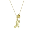 Collana placcata oro 18k con ciondolo lettera H corsiva, gemma verde e perline in pavé - Oro H
