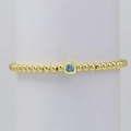 Pulsera de cuentas de latón con oro de 18K y una piedra de nacimiento azul cuadrada - Diciembre - Dorado