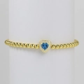 18k gold beaded elastic bracelet with a blue heart-shaped birthstone and zircon frame - December Bracelet